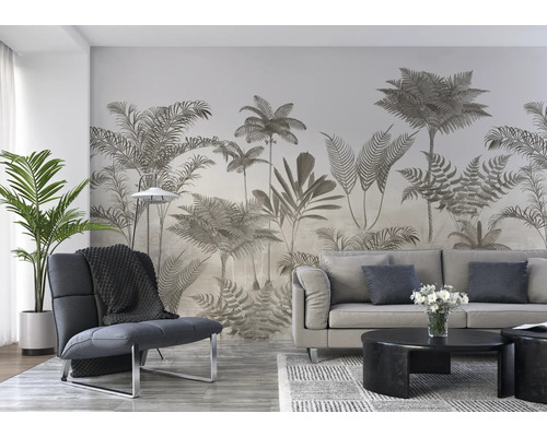 Woonkamer met bank, fauteuil, salontafel en een behang met jungle thema