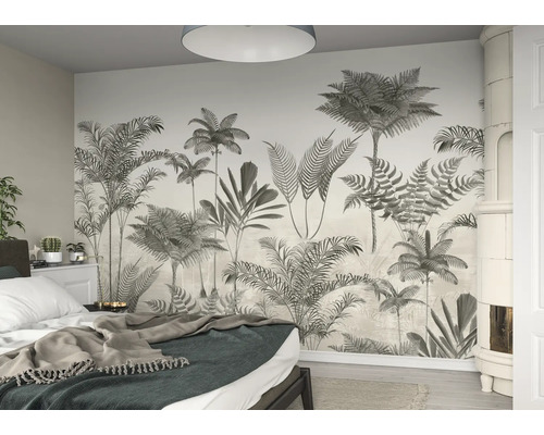 Slaapkamer met muurschildering met tropische plantmotieven