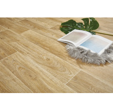 Houten laminaatvloer met boek en decoratie