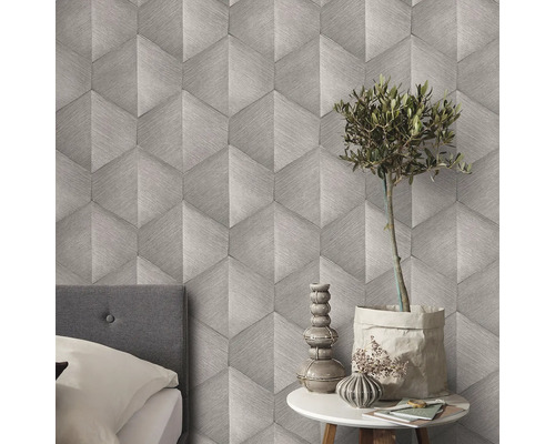 Behang met patroon met geometrisch ontwerp in de slaapkamer.