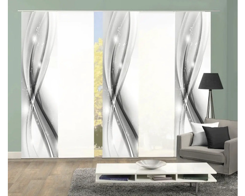 Schuifgordijnen met abstract ontwerp in een woonkamer