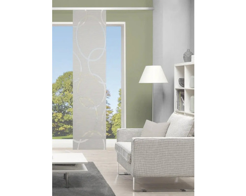 Woonkamer met schuifpaneel met cirkeldesign, bank en boekenkast