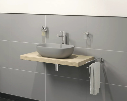 Badkamermeubel met opzetwastafel, kraan, zeepdispenser, tandenborstelbeker en handdoekhouder voor betegelde wand