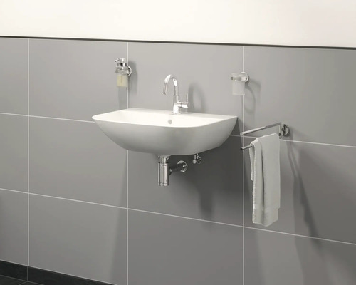 Badkamer met wastafel, kraan, handdoekhouder, zeepdispenser en bekerhouder