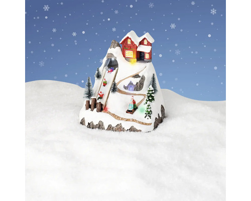 Decoratief winterlandschap met berghut en sleeërs