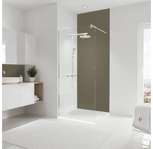 Moderne badkamer met douchecabine, wastafel en wit vloerkleed.