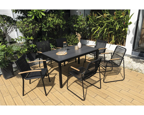 Tuinmeubelset met tafel en zes stoelen op een terras