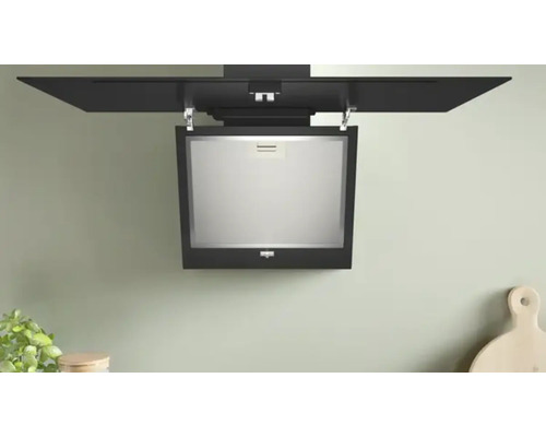 Wandgemonteerde afzuigkap in een keuken.