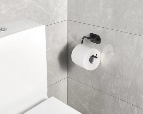 Toiletpapierhouder met toiletpapier aan een badkamermuur