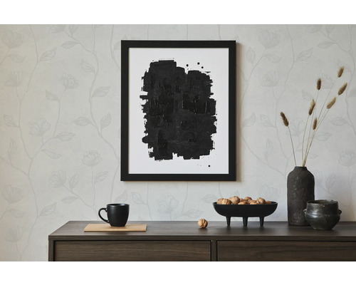 Decoratief stilleven met ingelijste abstracte afbeelding, servies en droogbloemen op een dressoir.