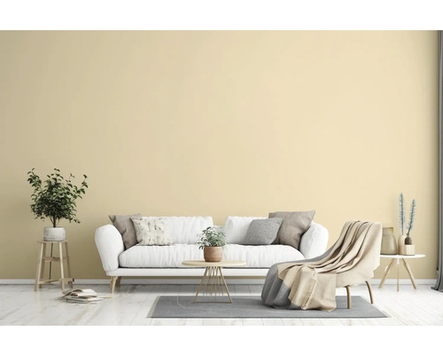 Woonkamer met bank, fauteuil en decoratie