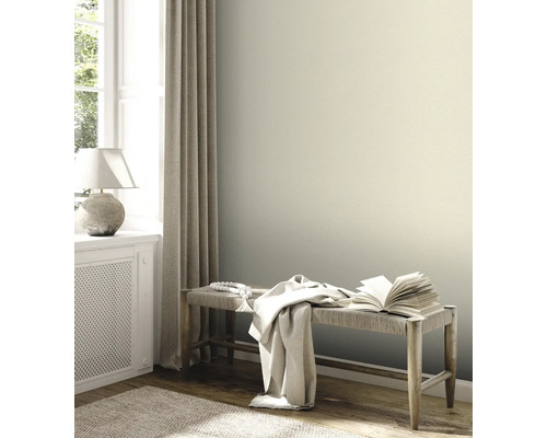 Woonkamerscène met bank, boek en gordijn