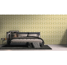 Slaapkamer met bed en geometrisch behang