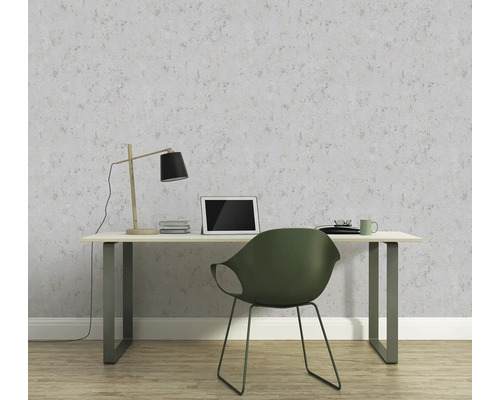 Kantoor met bureau, stoel, lamp, laptop en behang met motief