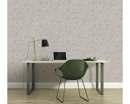 Werkkamer met bureau, lamp, laptop en behang met motief