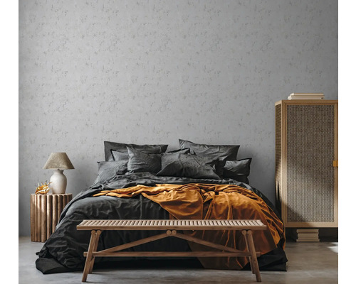 Slaapkamer met bed, bank en nachtkastje