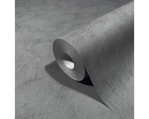 Een rol grijs structuurbehang