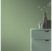 Wanddecoratie met ladekast, vaas en plant
