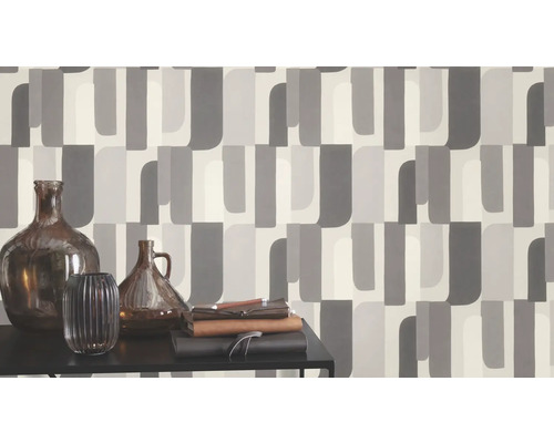 Fotobehang met grafisch patroon in grijstinten en vazen op een tafel