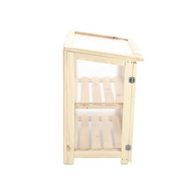 Houten kweekkas met planken voor de tuin