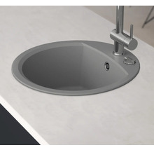 Ronde spoelbak met kraan op een werkblad