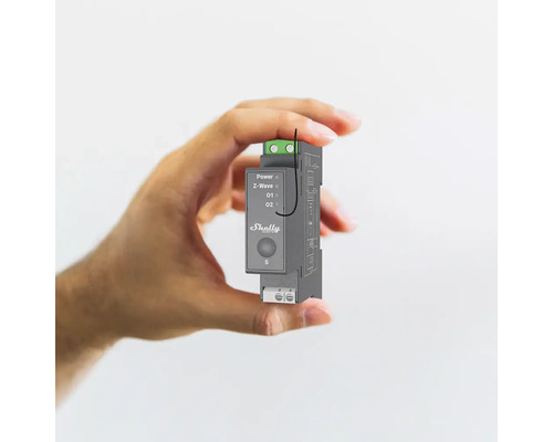 Hand houdt Shelly Z-Wave actor voor domotica vast