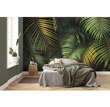 Slaapkamer met fotobehang met plantenmotieven, bed en decoraties