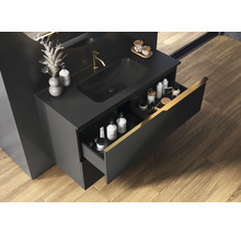 Badkamer met zwarte wastafelonderkast, open lade-element en opzetwastafel