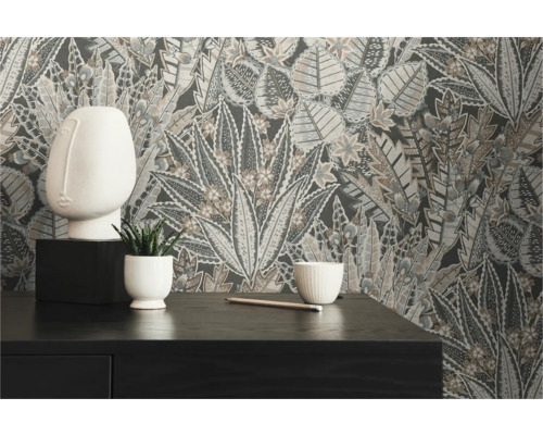 Kameroverzicht met patroonbehang, decoratief figuur en plant