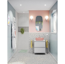 Moderne badkamer met wastafelmeubel, spiegel, radiator en terrazzo vloer.