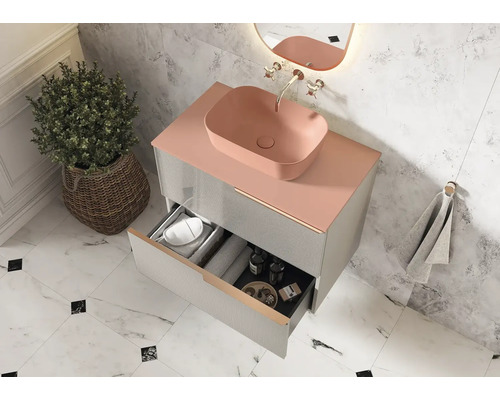 Badkamer met wastafelonderkast, opzetwastafel en open lade