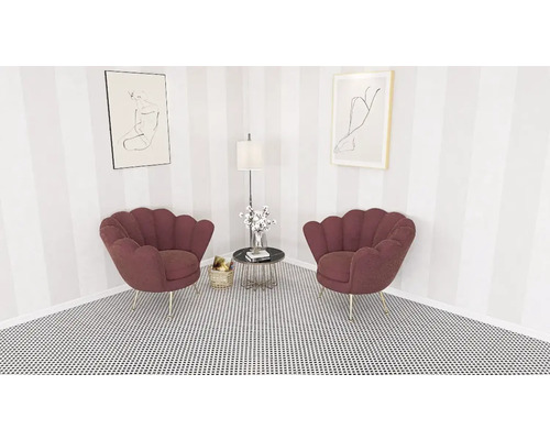 Hoekkamer met twee schelpvormige stoelen, bijzettafel, staande lamp en kunstwerken aan de muur