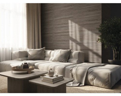 Woonkamer met modulaire bank, salontafels en kamerplant