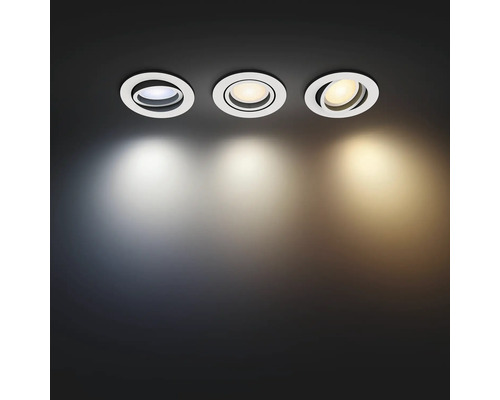 Drie inbouwspots met verschillende lichtkleuren