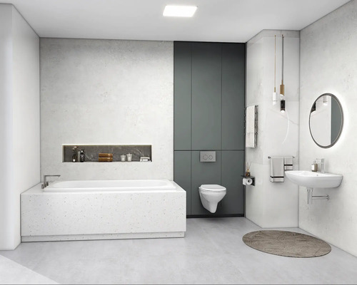 Moderne badkamer met ligbad, toilet, wastafel en spiegel