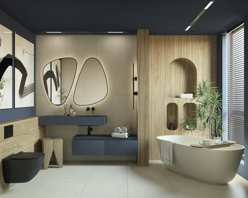 Moderne badkamer met vrijstaand bad, wastafel, spiegel en toilet.