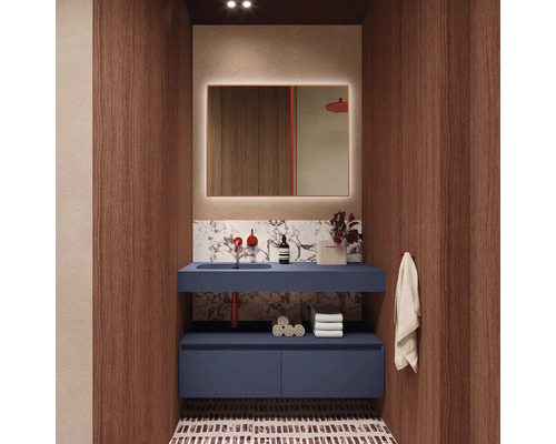 Moderne badkamer met blauw wastafelonderkast, verlichte spiegel en houten panelen