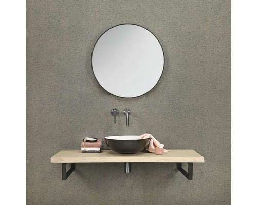 Badkamer met ronde spiegel, wastafelblad en opzetwastafel