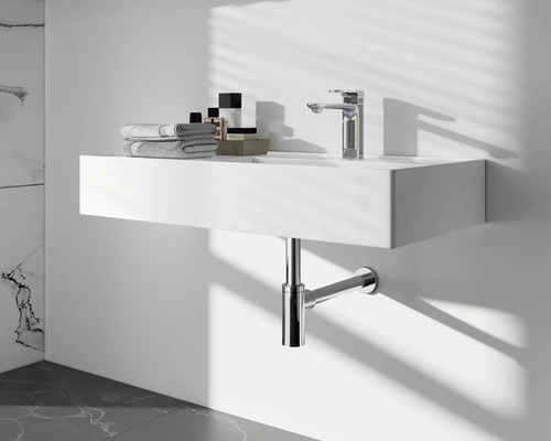 Moderne badkamer met wastafel, kraan en sifon