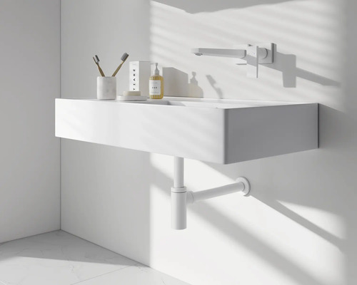 Moderne badkamer met wastafel, kraan en sifon