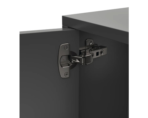 Meubelscharnier op een grijs meubelstuk