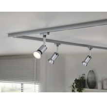 Plafondrail met drie spots in interieur