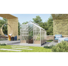 Kas in de tuin met hangmand en zithoek