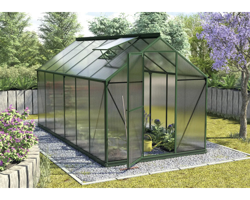 Tuinkas met open deur en dakraam in de tuin