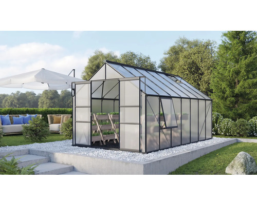 VITAVIA Tuinkas Meridian 2 11500 polycarbonaat 4 mm zwart, 257x445x231,8 cm Kas met open deur in een tuin met zithoek en parasol