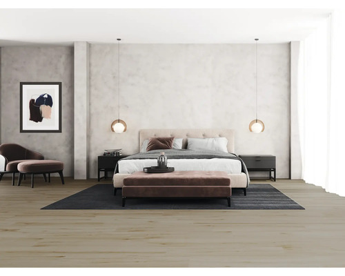Slaapkamer met tweepersoonsbed, nachtkastjes, vloerkleed en zitmeubels