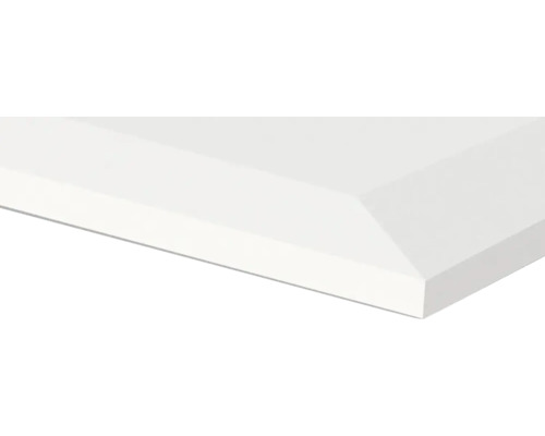 Detailopname van een witte wandtegel met afgeschuinde rand