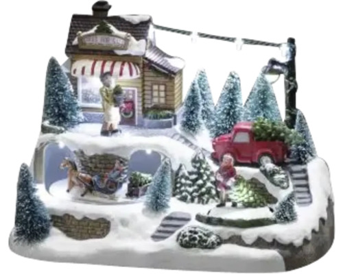 Decoratieve kerstscène met figuren, huis, kerstbomen en verlichting