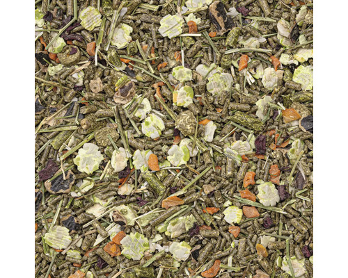 Close-up van voer voor kleine huisdieren met groenten en granen