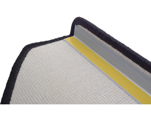 Detailopname van een tapijt met randbeschermingsprofiel